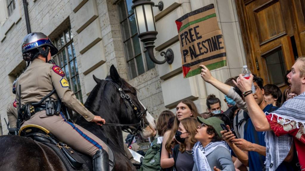 Mounted police work to contain demonstrators protesting the war in Gaza at the University of Texas at Austin