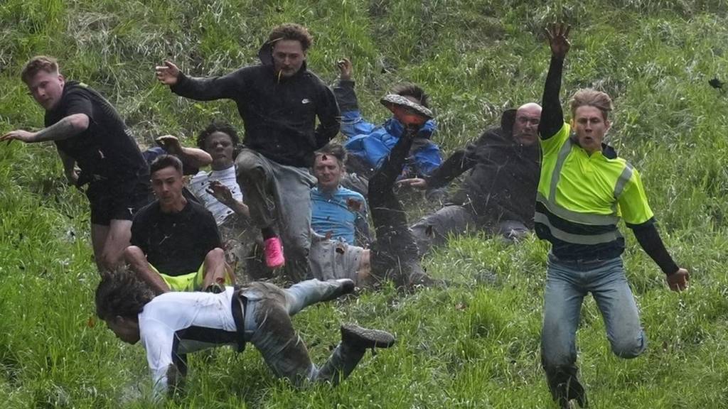 Cheese rolling contestants on Cooper's Hill in Gloucestershire