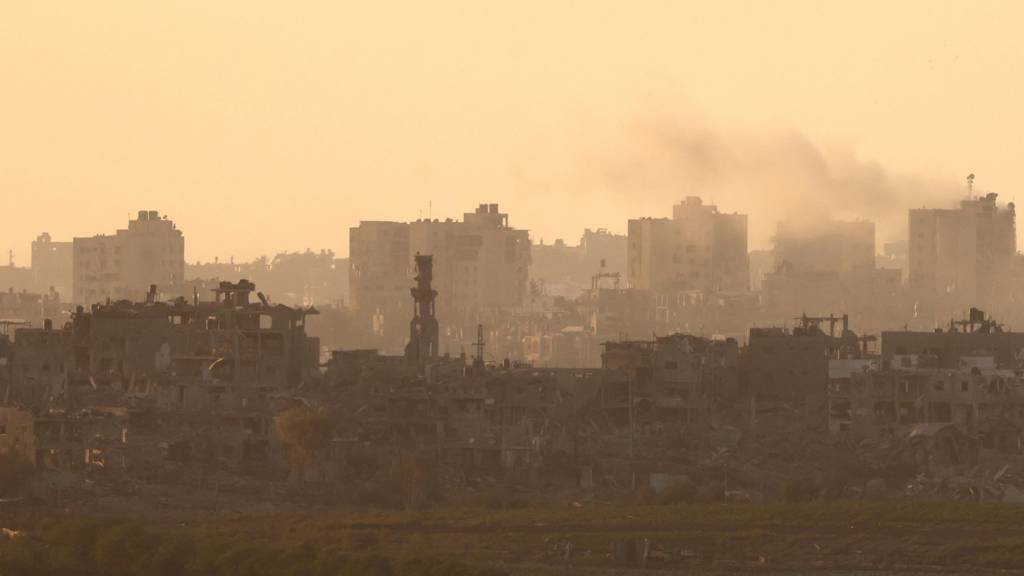 Smoke billows in the northern part of the Gaza Strip, as seen from Sderot, Israel, 10 November 2023.