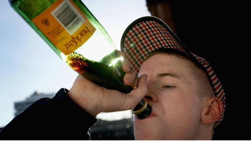 Man drinking buckfast