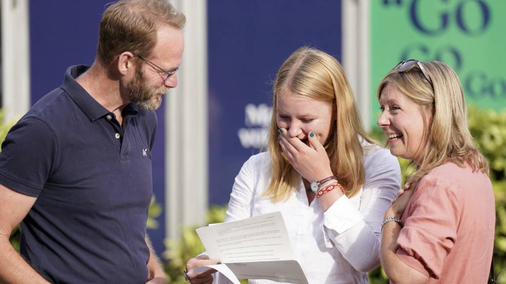 A student reacts when reading their A-level results at Norwich School, Norwich. 18 August 2022