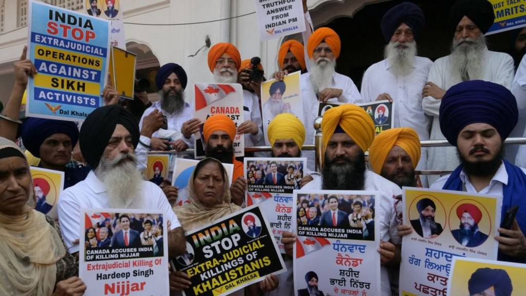 Activists of the Dal Khalsa Sikh organisation, a pro-Khalistan group, stage a demonstration demanding justice for Sikh separatist Hardeep Singh Nijjar, who was killed in June 2023 near Vancouver, after offering prayers at the at Akal Takht Sahib in the Golden Temple in Amritsar on September 29, 2023