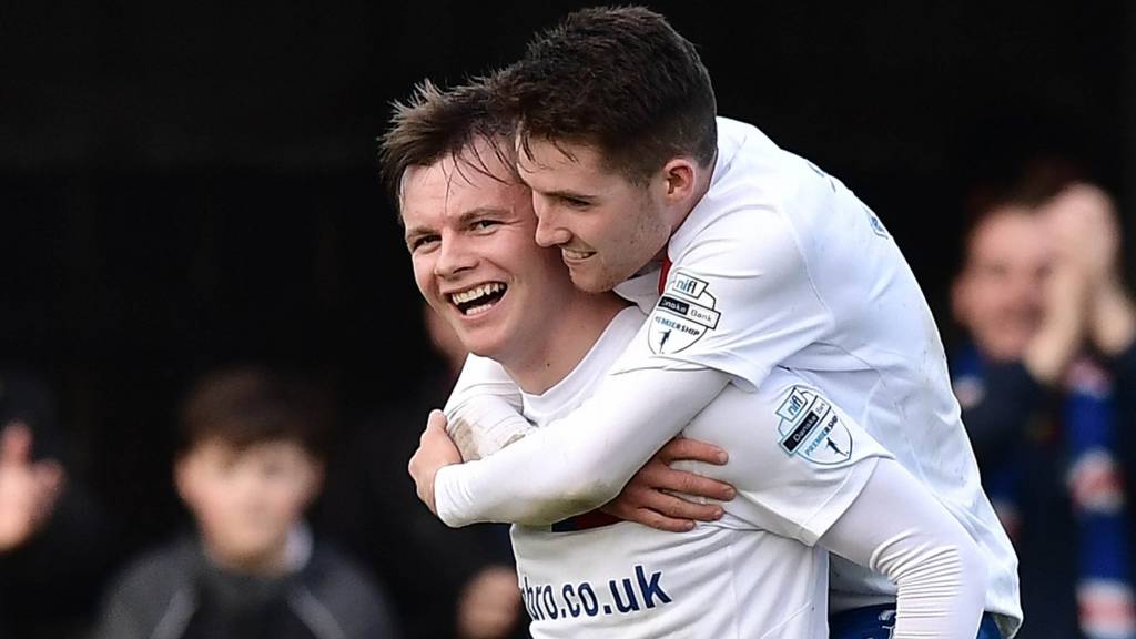 Linfield celebrate Niall Quinn's goal against Dungannon