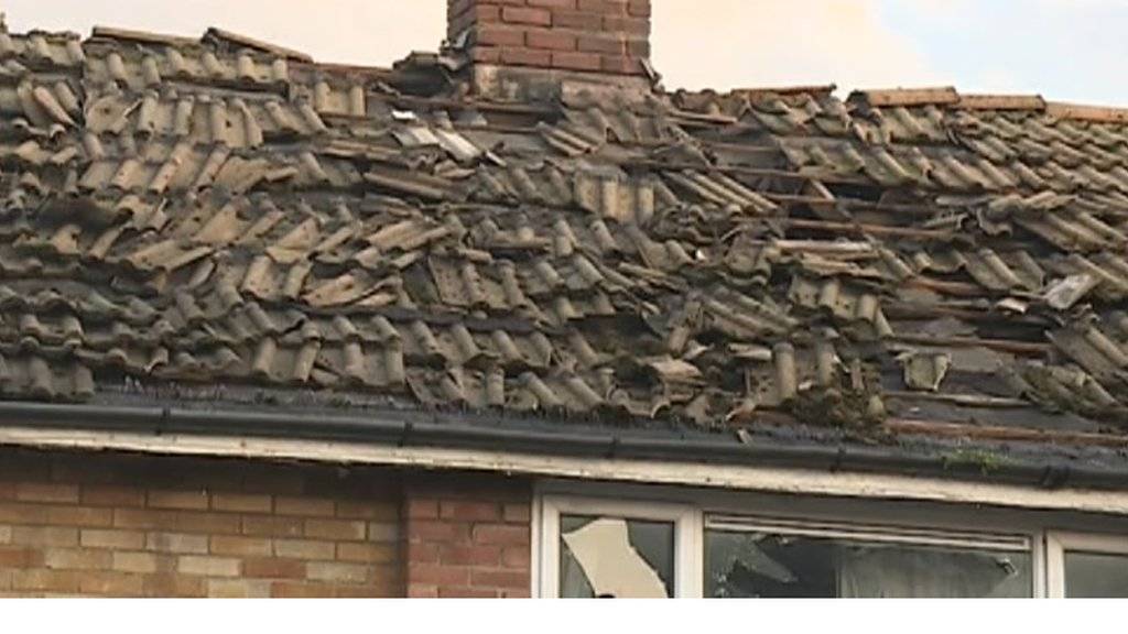 Lightning strike, damaged roof