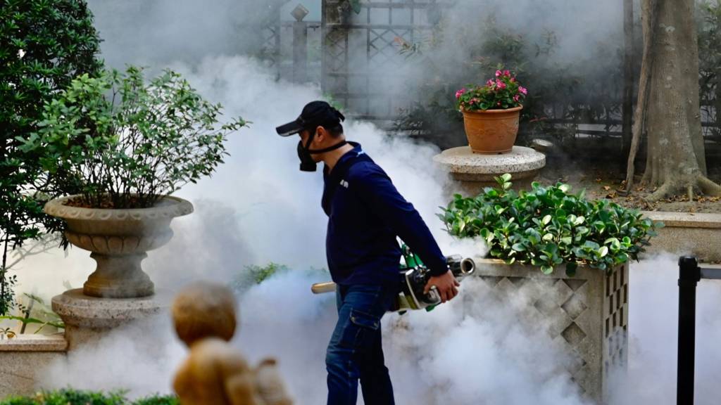 Worker disinfects park in Taiwan