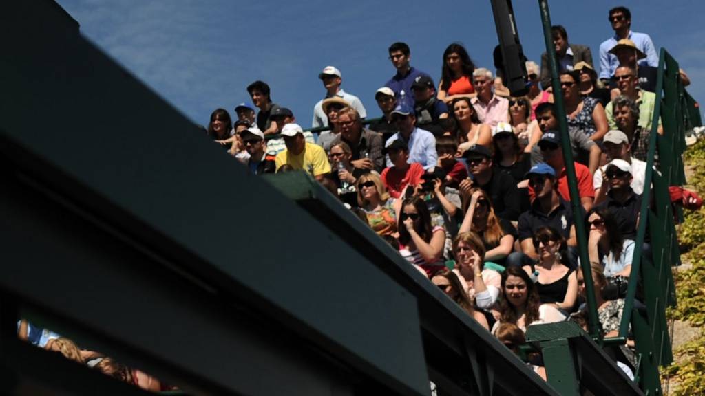 A crowd watches on at Wimbledon