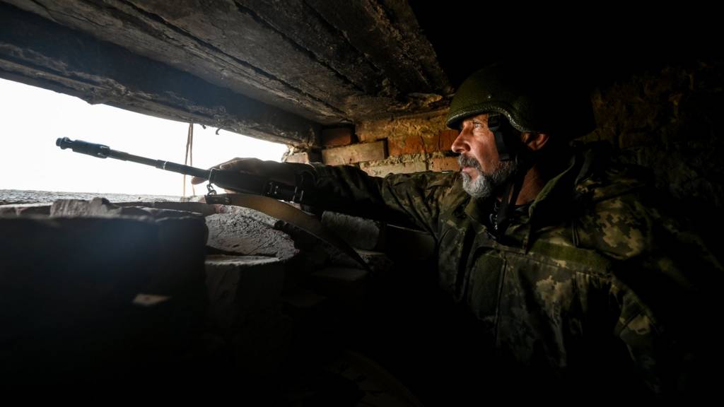 Soldiers continue to patrol the area following Russian attacks in Zaporizhzhia Oblast