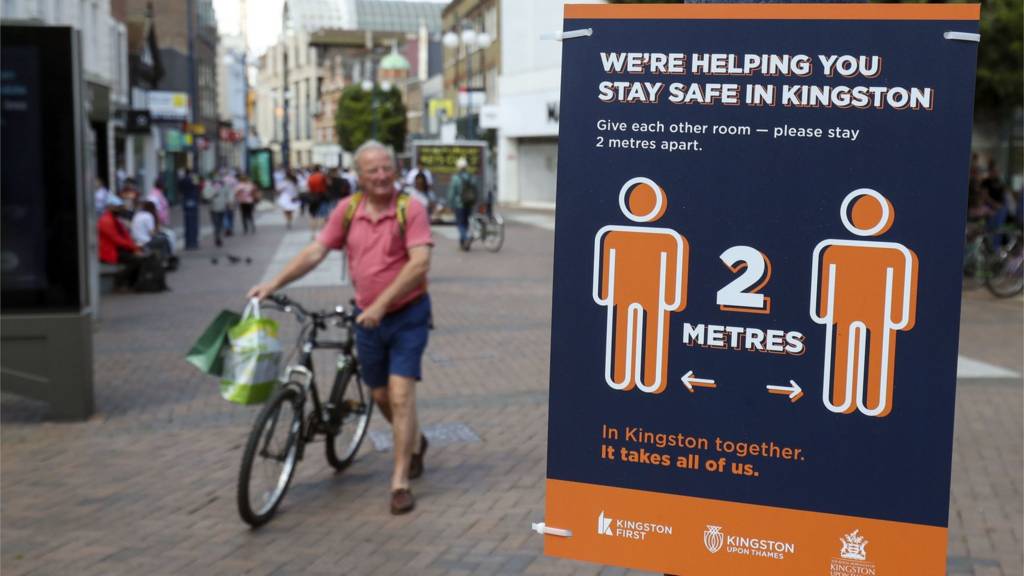 File photo dated 15/6/2020 of social distancing signs in Kingston
