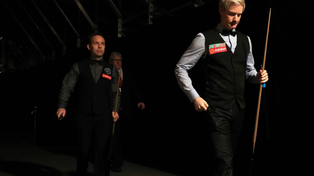 Neil Robertson and Ali Carter walk out