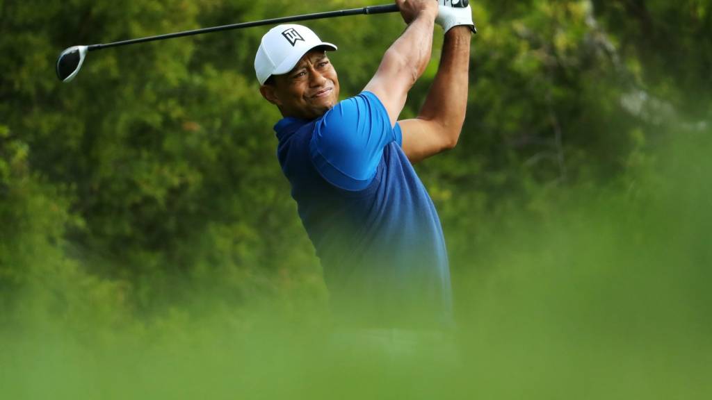 Tiger Woods takes a tee shot in the opening round of the 2019 US PGA Championship