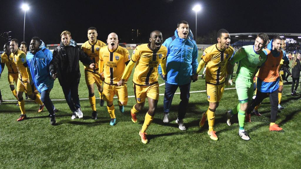 Sutton players celebrate