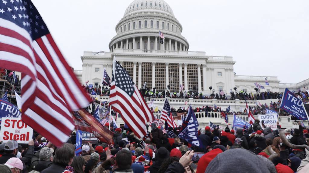 Pro-Trump protesters occupy the grounds of the West Front of the US Capitol, in Washington DC, USA, 6 January 2021