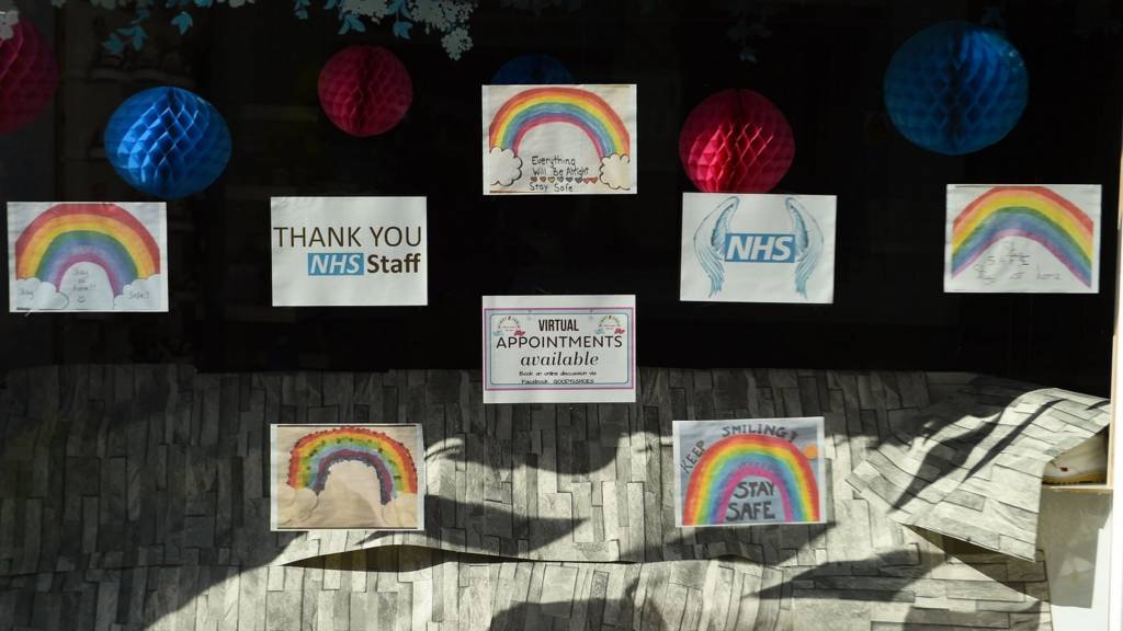 Signs in a shop window in Ayr
