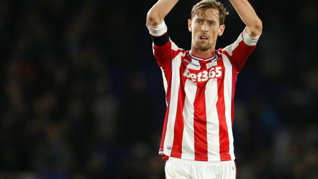 Peter Crouch applauds