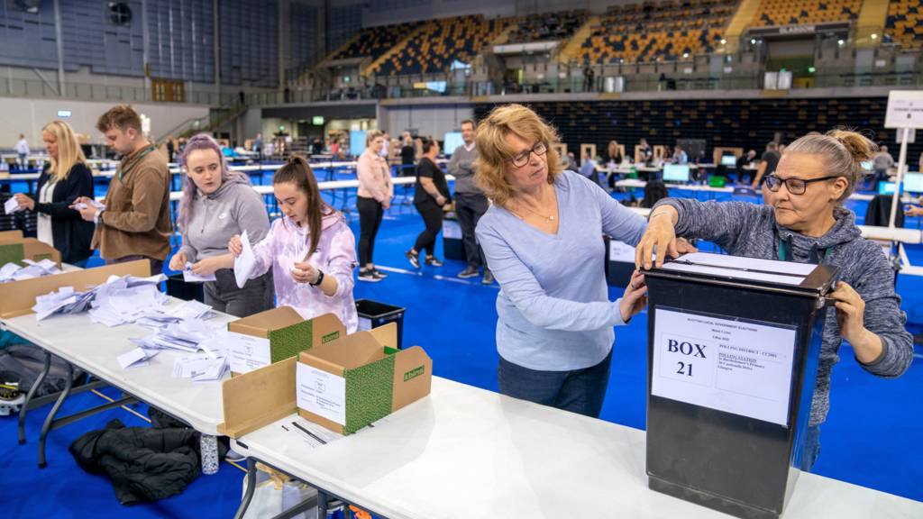 Ballot boxes are opened ready for sorting at the Glasgow City Council count at the Emirates Arena, in Glasgow, on 6 May 2022