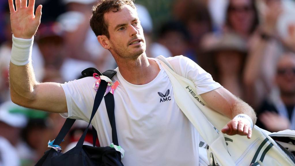 Andy Murray waves to the Centre Court crowd after losing to Stefanos Tsitsipas