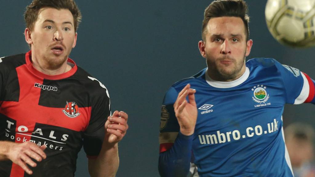 Crusaders Billy Joe Burns in action against Linfield's Andrew Waterworth