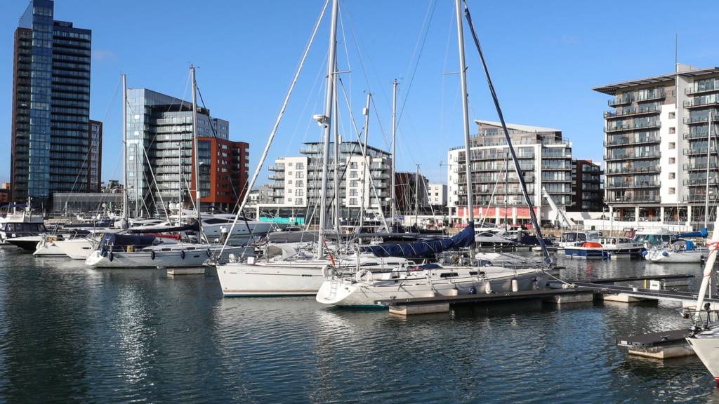 Yachts and modern tower blocks in Southampton