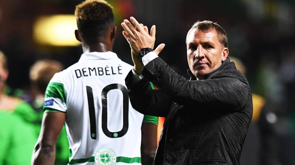 Manager Brendan Rodgers salutes the Celtic fans
