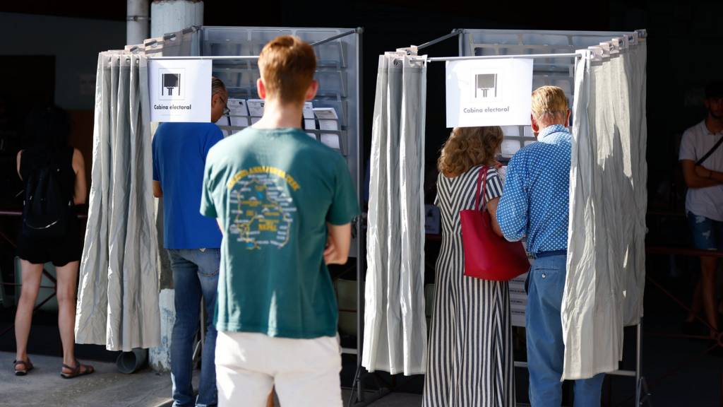 Citizens cast their votes for the general election at a polling station in Madrid, Spain on July 23, 2023