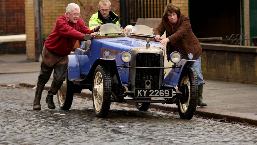 A car being wheeled