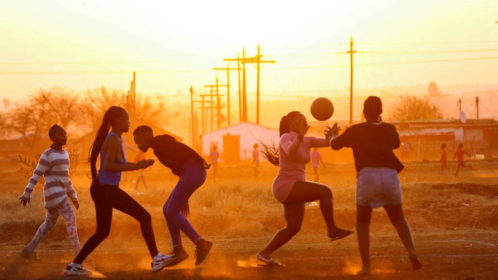 Members of the "Happy Girls" netball team take part in a practice session at Katlehong township, south-east of Johannesburg, South Africa - 10 June 2022