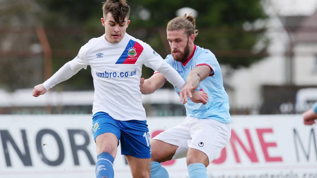 Action from Ballymena United against Linfield