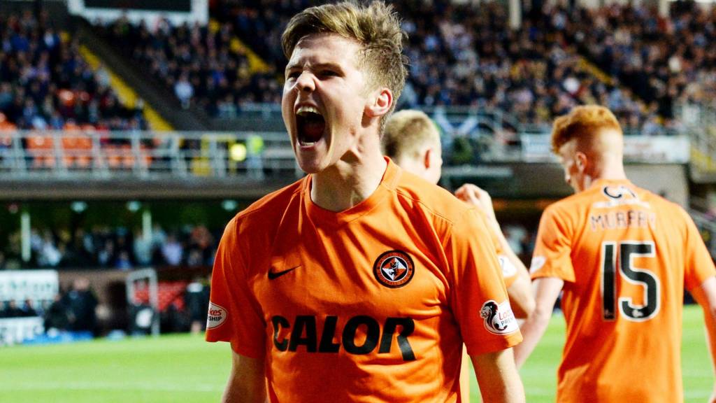 Blair Spittal celebrates after scoring for Dundee United against Dundee