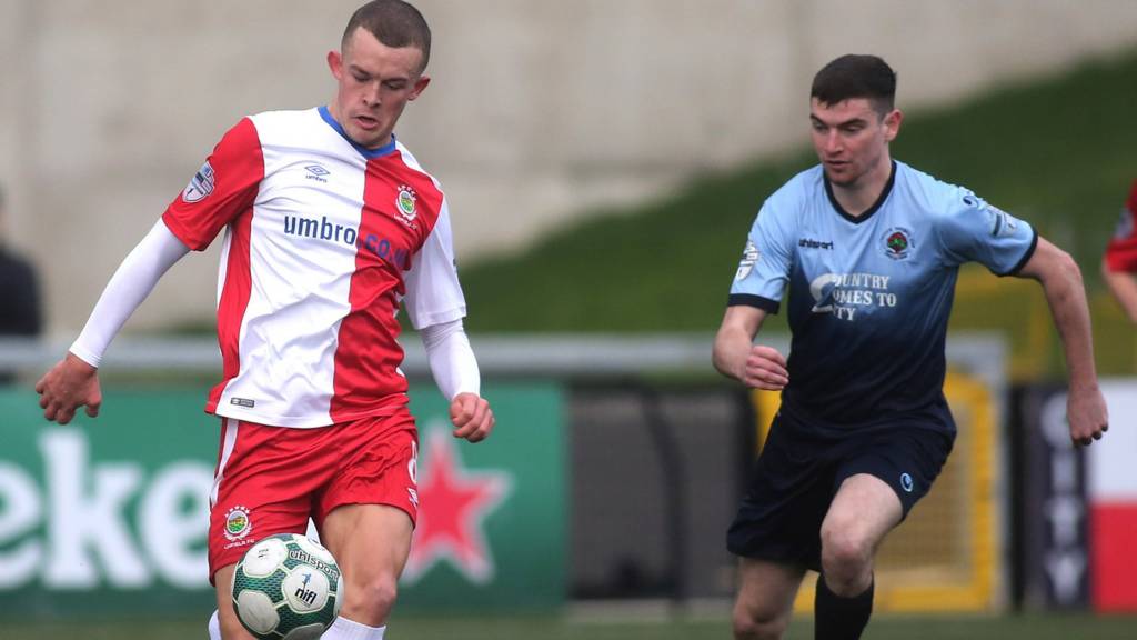 Linfield's Michael O'Connor and Caoimhin Bonner of Institute