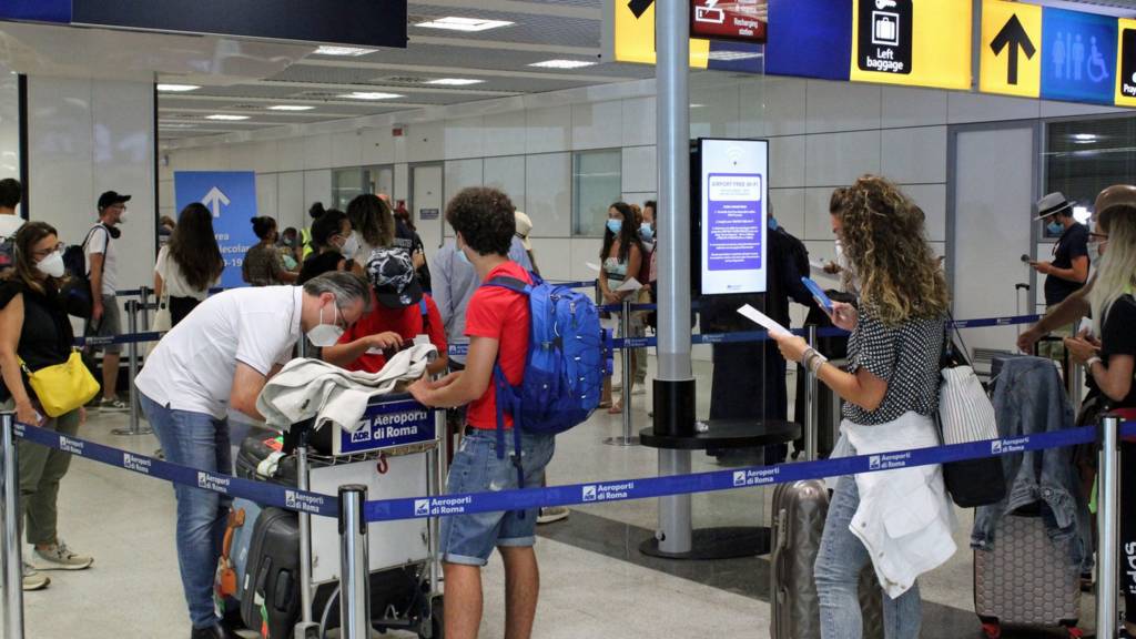 Passengers arrive at Rome"s international airport of Leonardo Da Vinci in Fiumicino, Italy, 17 August 2020