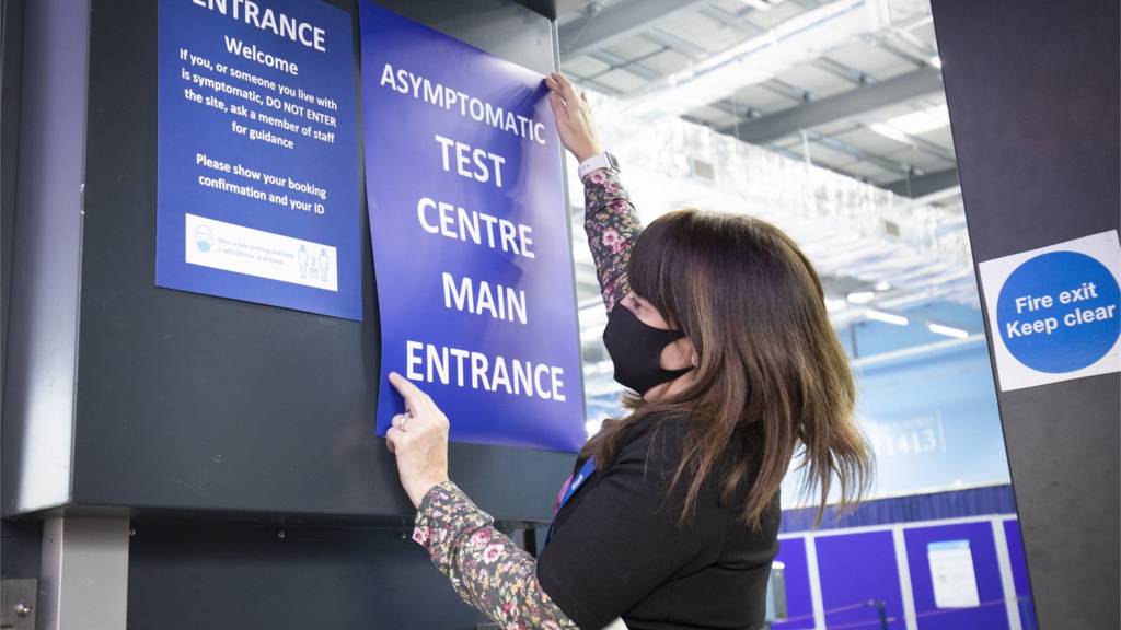 Sign for asymptomatic testing being put up