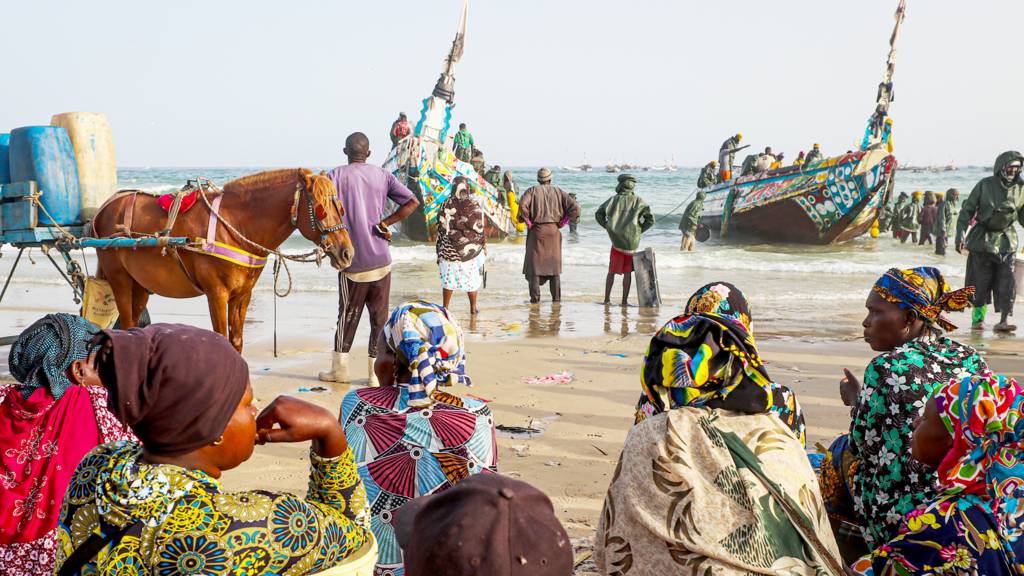 A view from Kayar as fishermen working on the beach in Senegal - 20 April 2024
