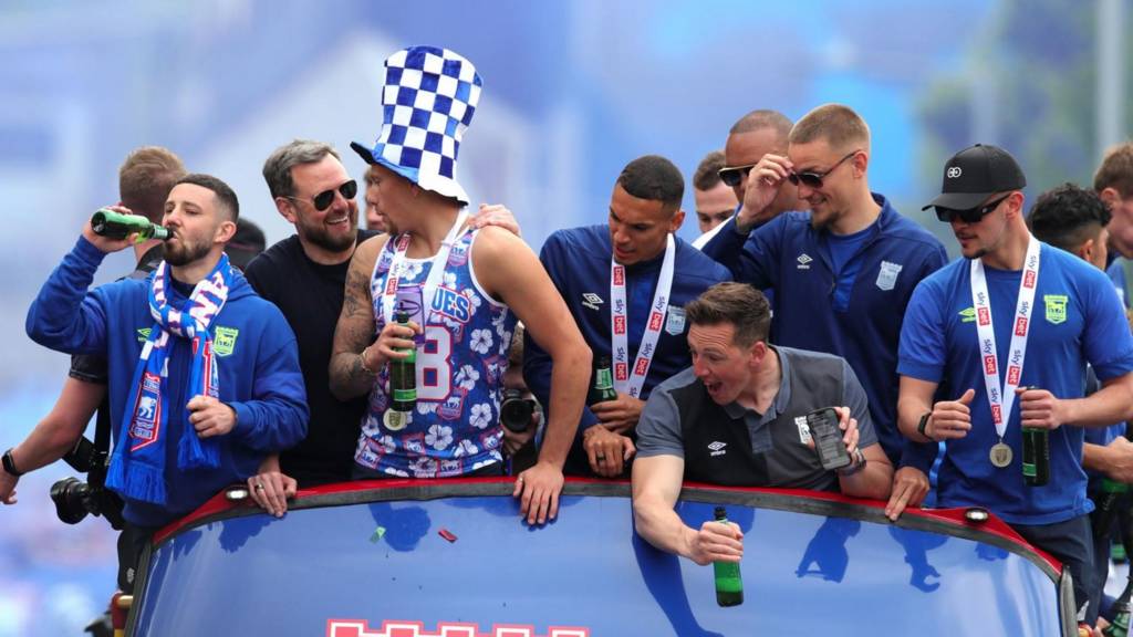 Ipswich Town players on an open-top bus