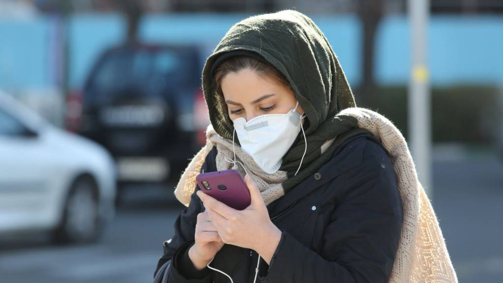 Iranian woman wearing a protective mask in Tehran on 2 March