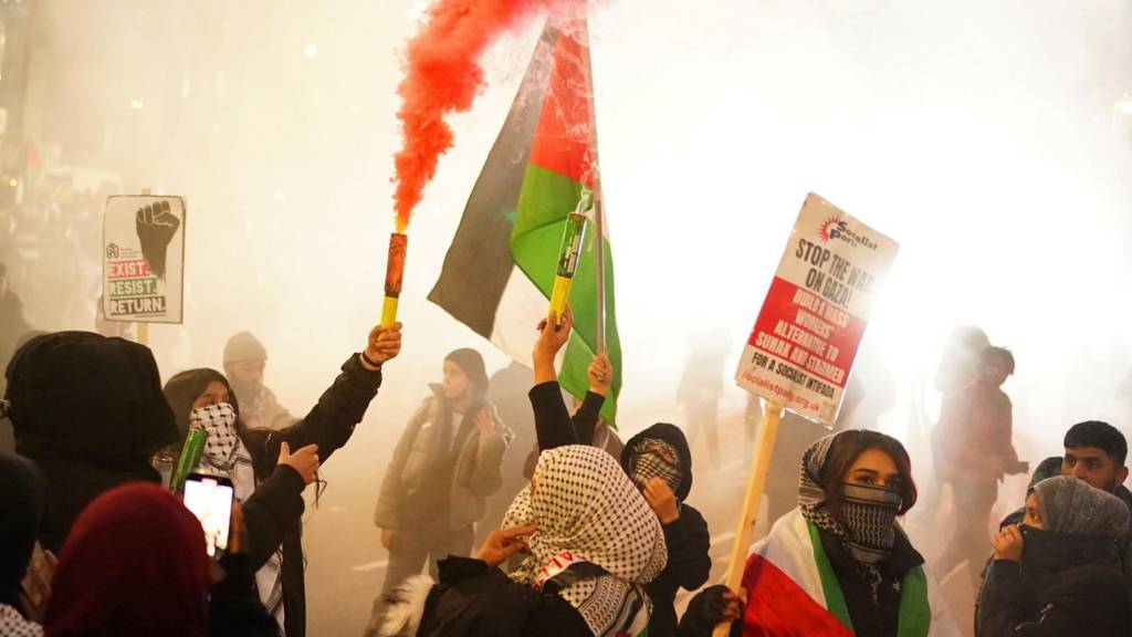 People during a pro-Palestinian protest in London, marching from Hyde Park to the US embassy in Vauxhall. Picture date: Saturday November 11, 2023