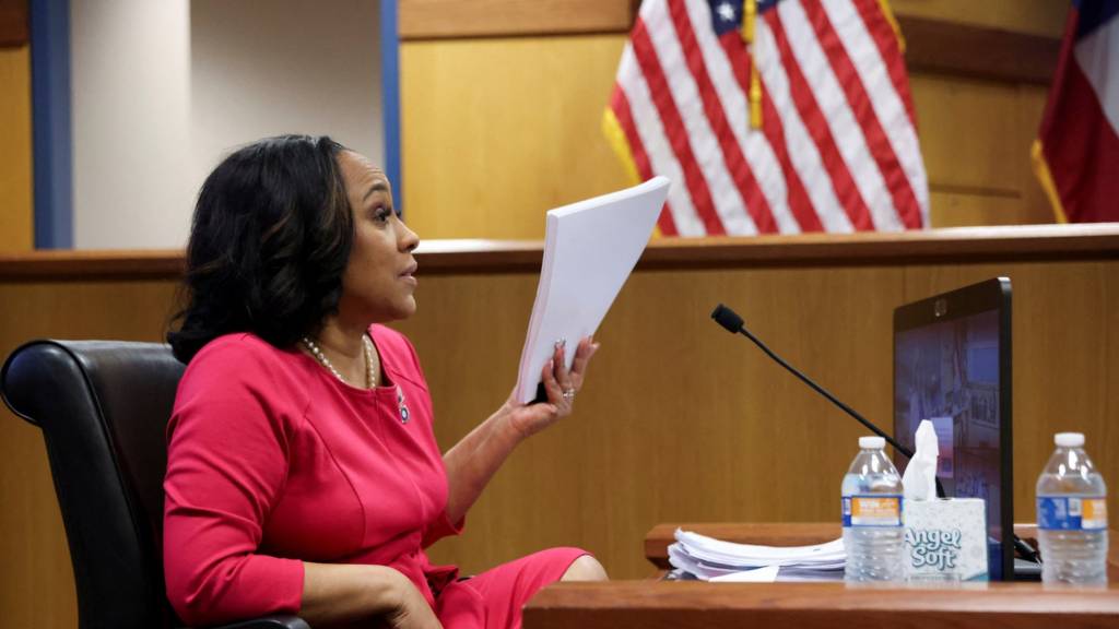 Attorney Fani Willis speaks from a witness stand during a hearing in the case of State of Georgia v. Donald John Trump at the Fulton County Courthouse in Atlanta, Georgia, U.S., February 15, 2024. REUTERS/Alyssa Pointer/Pool