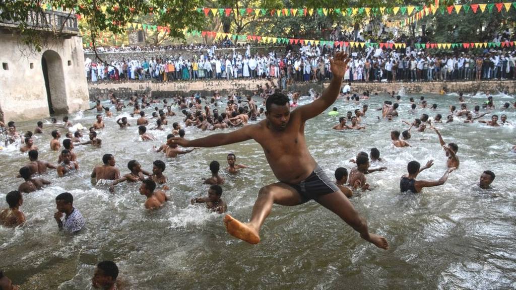People in the Fasilides Bath during the annual Timkat epiphany celebration in Gondar, Ethiopia - Thursday 19 January 2017