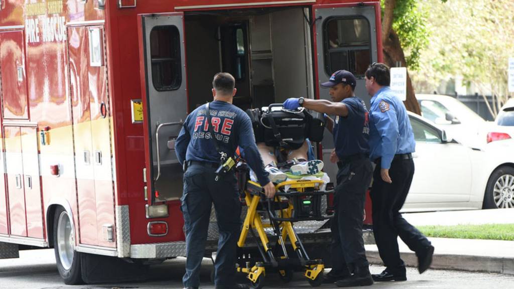 A shooting victim is unloaded from an ambulance and taken into Broward Health Trauma Center in Fort Lauderdale.