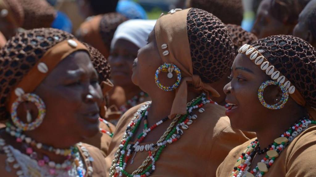 Women in traditional regalia sing to welcome the United Nations (UN) Secretary-General, and Kenya's first-lady during an event to commemorate the International Women's Day on March 8, 2017 in Nairobi