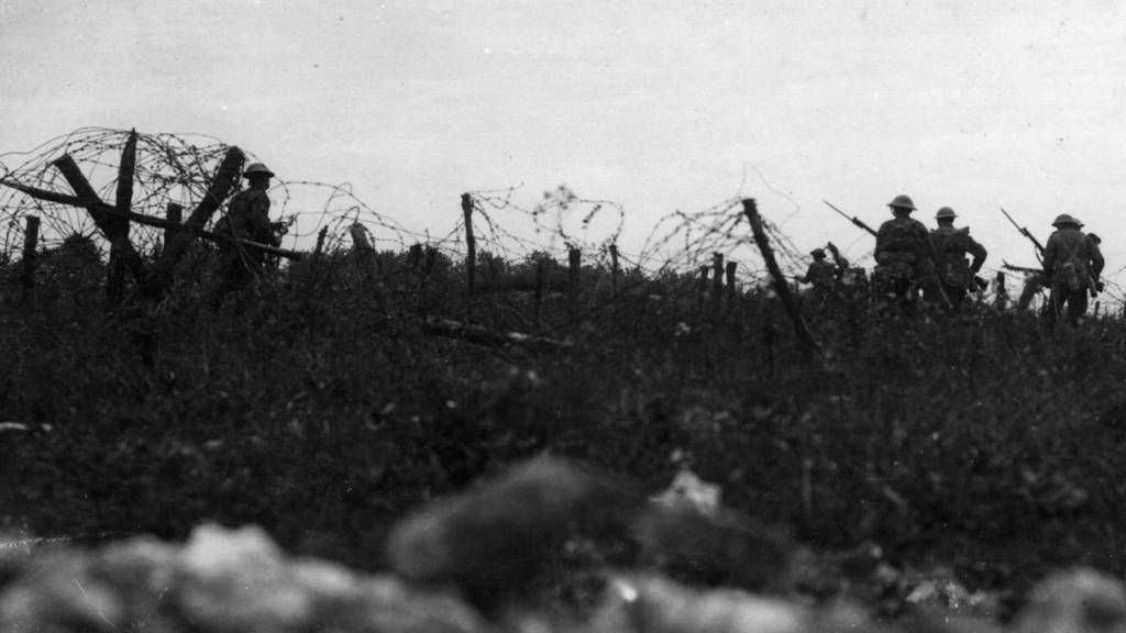 British soldiers move towards the German lines on 1 July 1916 at the Battle of the Somme