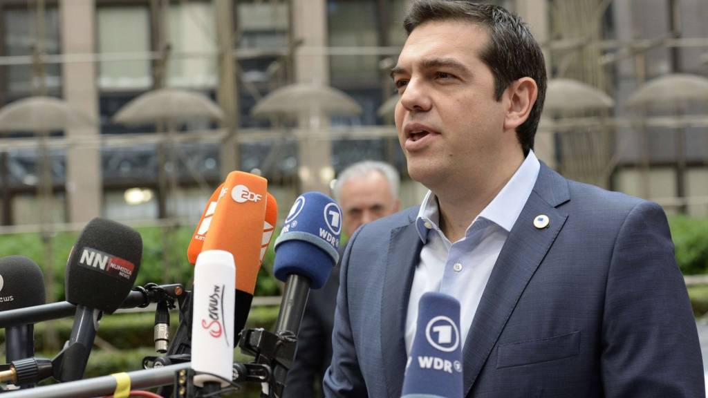 Greek Prime Minister Alexis Tsipras gives a statement as he arrives for a meeting of eurozone leaders in Brussels on 12 July 2015