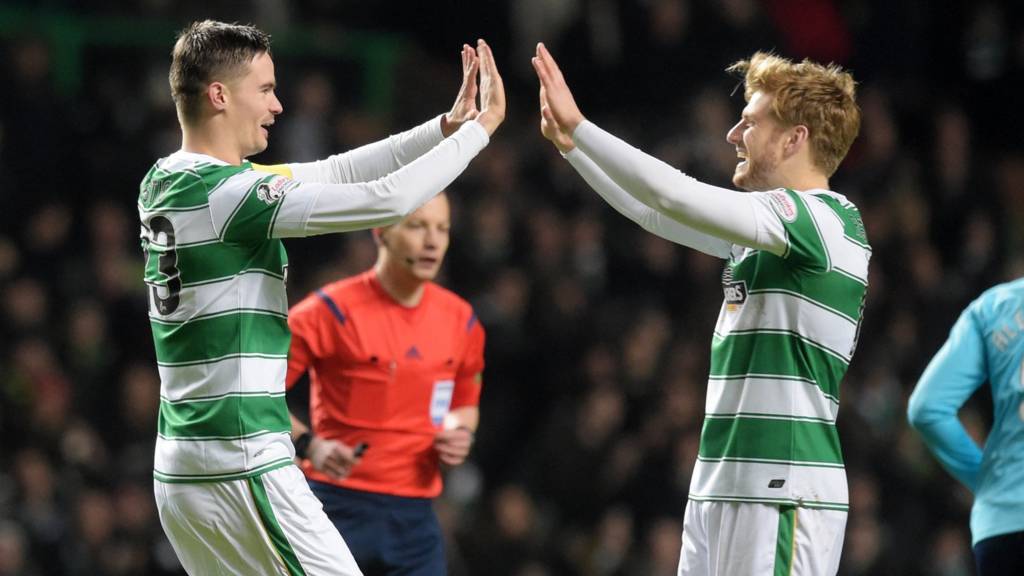Mikael Lustig celebrates Celtic's opening goal with Stuart Armstrong