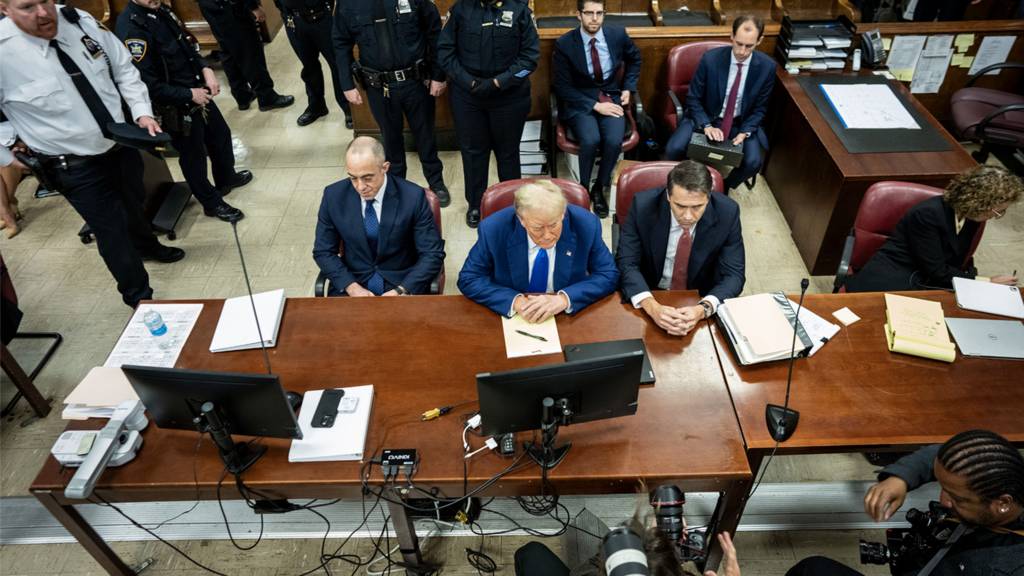 Donald Trump and attorneys in court on 3 May