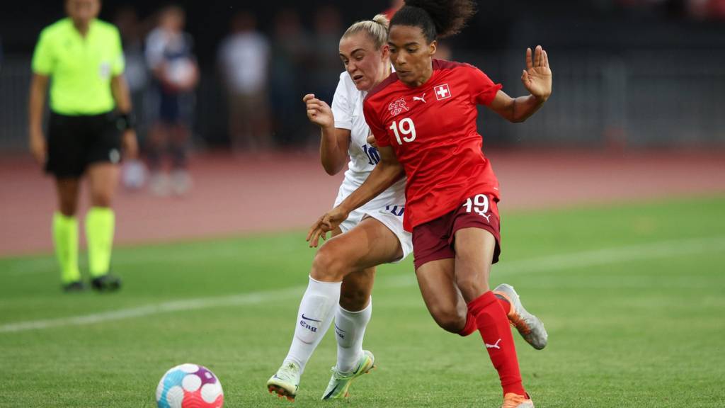 Georgia Stanway of England is challenged by Eseosa Aigbogun of Switzerland