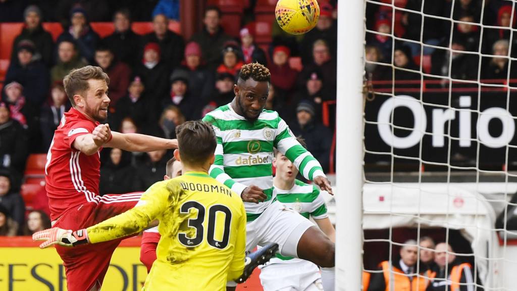 Moussa Dembele heads Celtic in front against Aberdeen