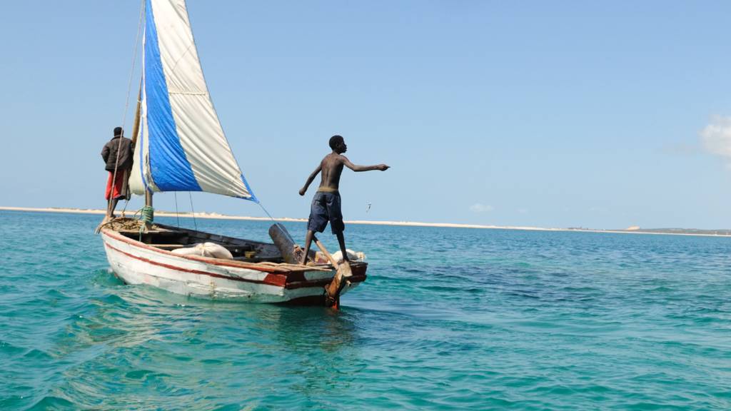 Fisherman at sea on a boat off Mozambique
