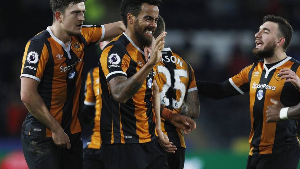 Tom Huddlestone and team mates celebrate