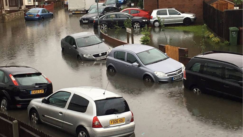 Cars on a flooded street