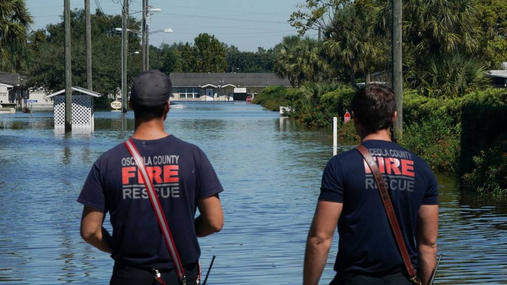 Osceola County Firefighters inspect the flooded Good Samaritan Society Village, following Hurricane Ian