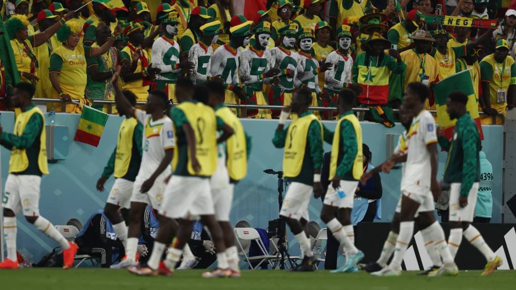 Senegal Players walk past their fans at the FIFA World Cup Qatar 2022